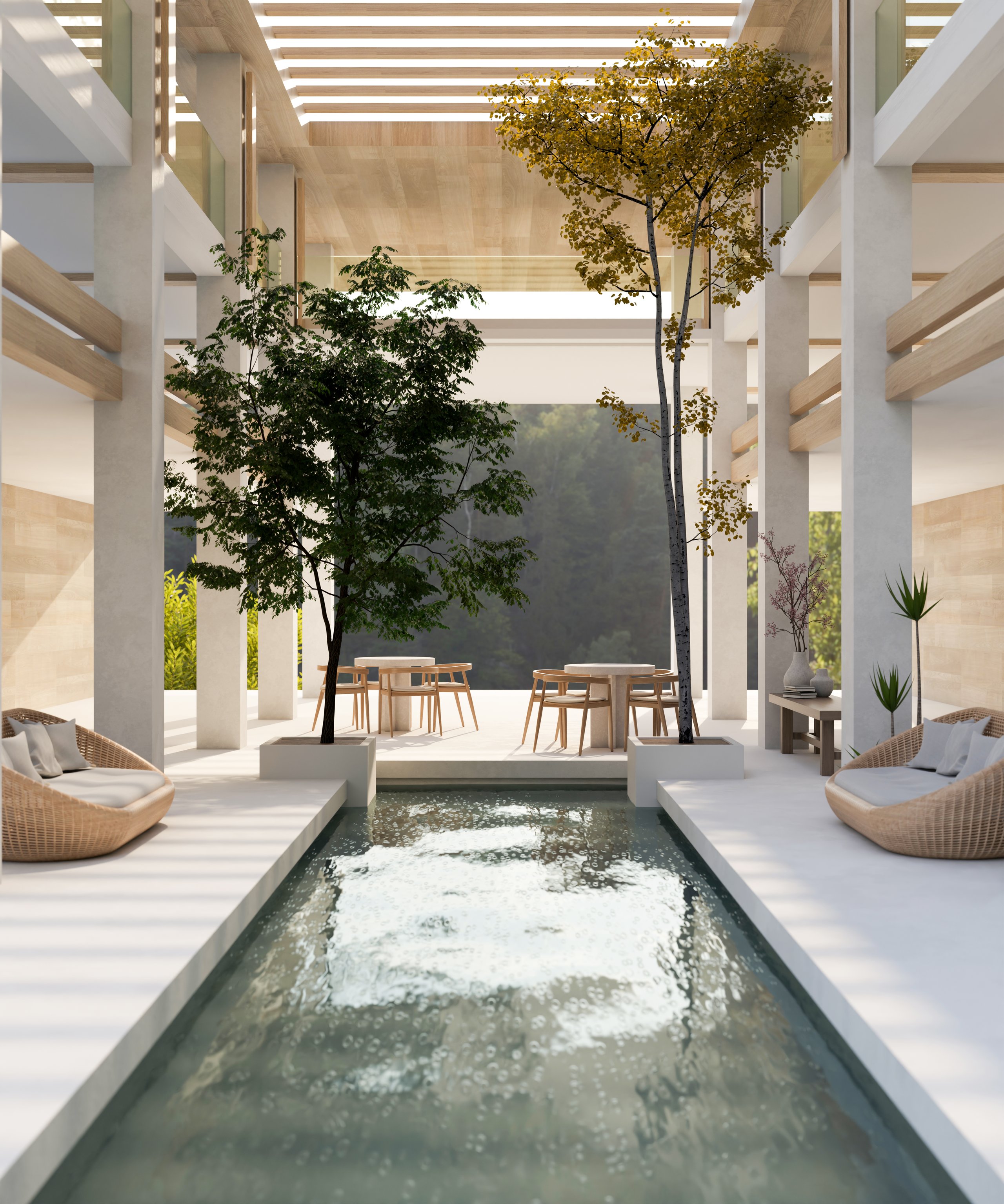 Hall d'hôtel moderne avec piscine intérieure et canapés en rotin — Villa Estérel